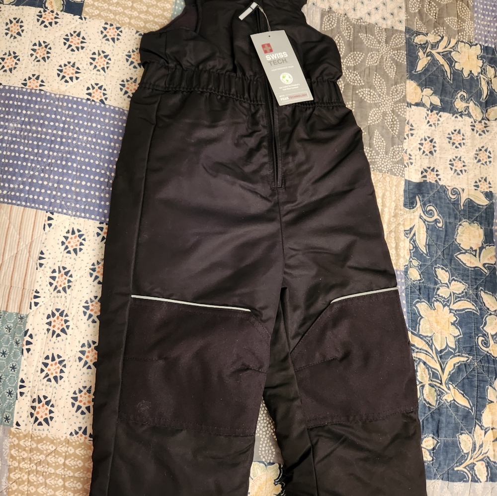 Little boys size 3T snow pants. Black. New with tags.  Never worn.